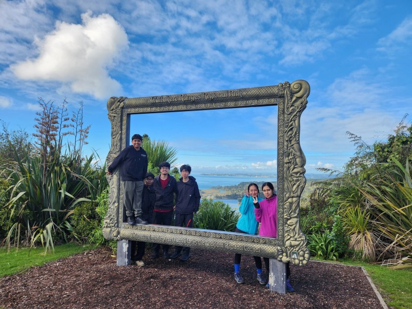 Bronze Award students hiking through the Waitākere Ranges.